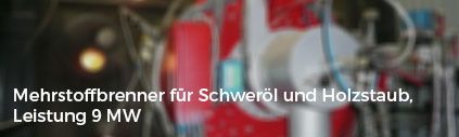 A blurred image of a machine with the words mehrstoffbrenner for schwerol und holzstaub