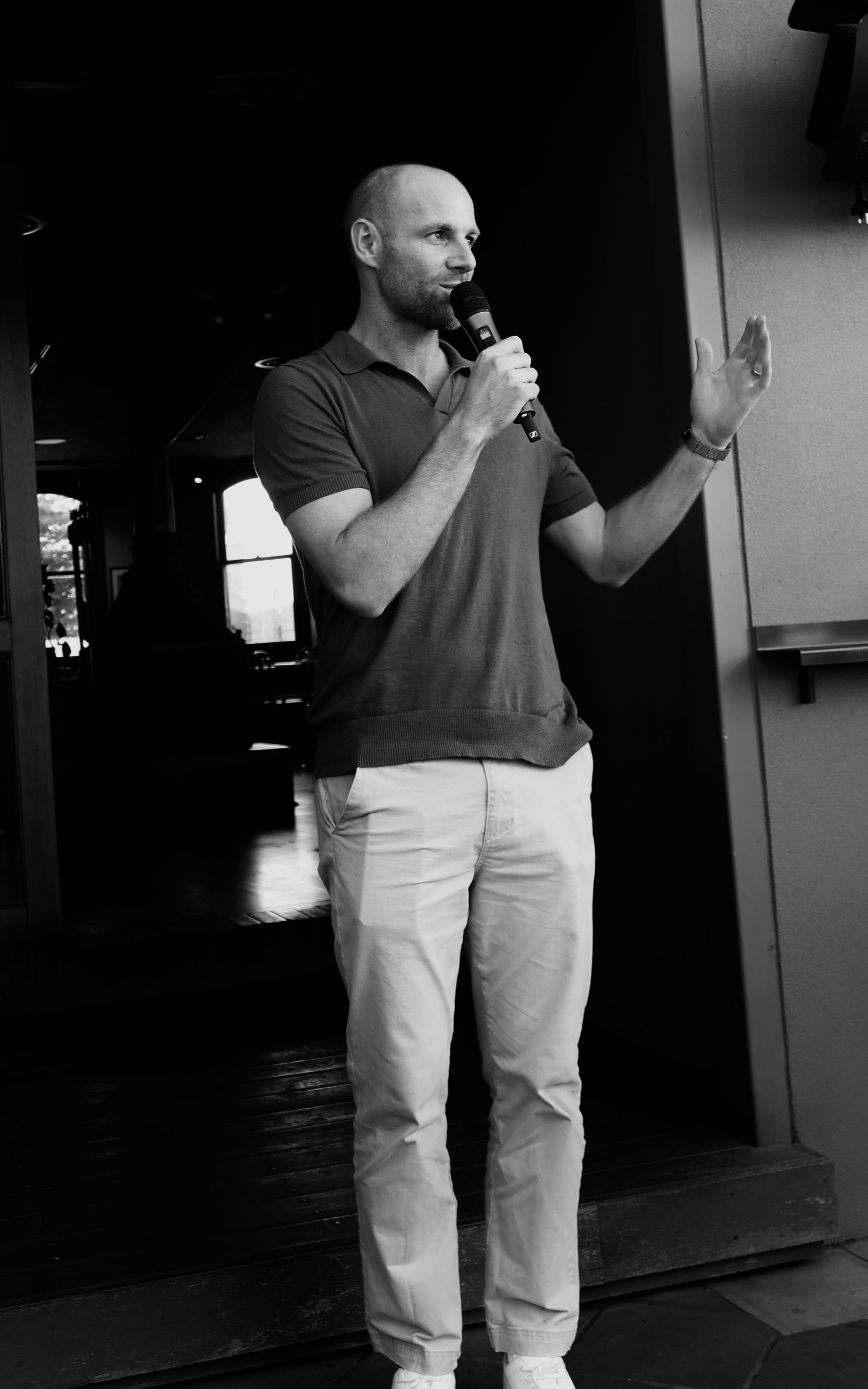 Sam Docherty speaking at an event