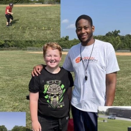 Coach Landon standing with young athletes after a private training session