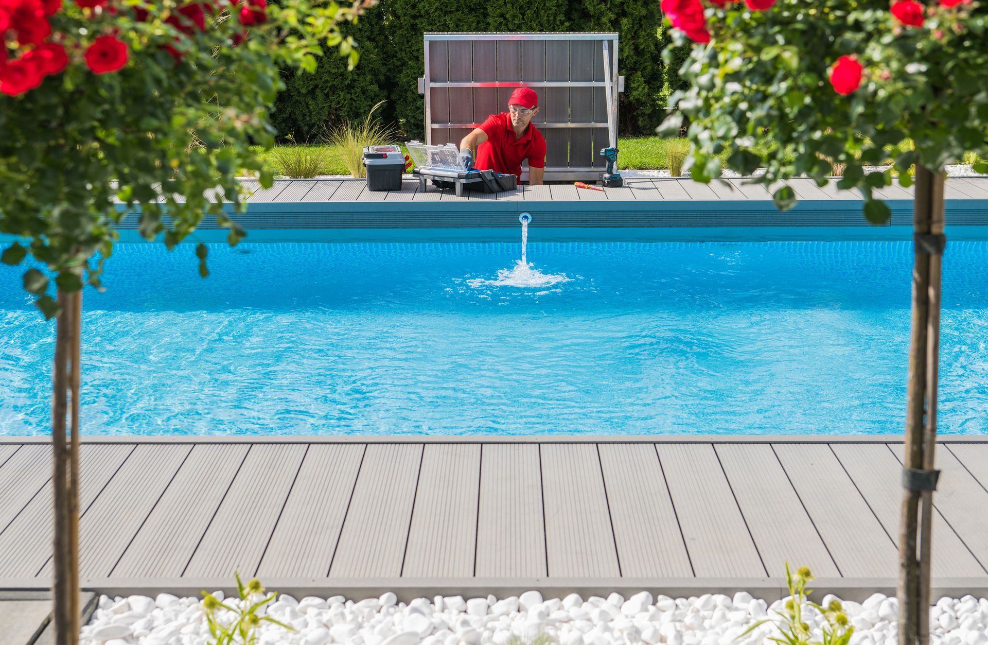 Technician repairing a pool, highlighting a swimming pool contractor providing expert services. Technician repairing a pool, highlighting a swimming pool contractor providing expert services.