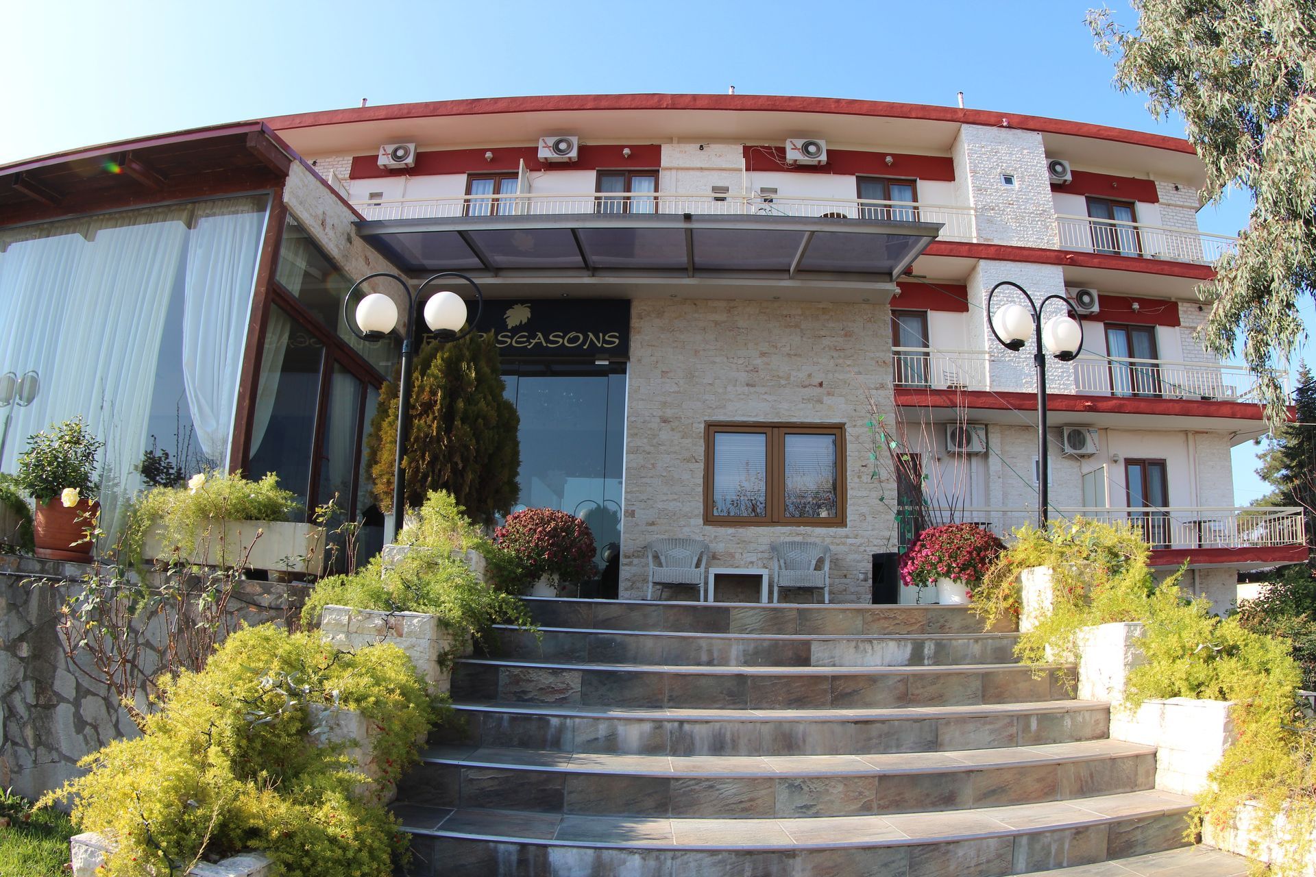 A large building with stairs leading up to it