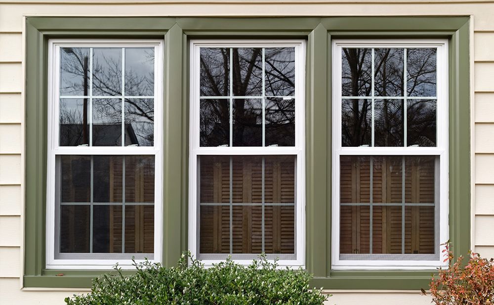 Windows With Green Frame — Mandan, ND — Ressler Siding & Windows