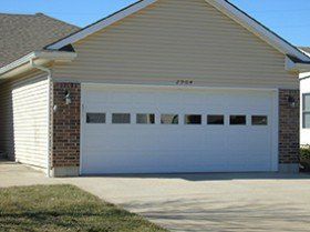 Garage with metal door — metal garage door in Harrisonville, MO