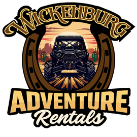 A logo for wickenburg with a horseshoe and a jeep in the middle.