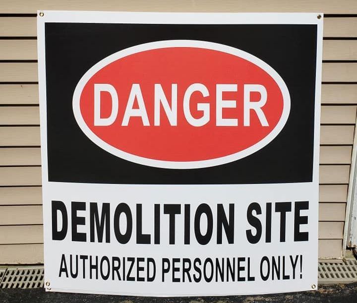 A sign that says danger demolition site authorized personnel only