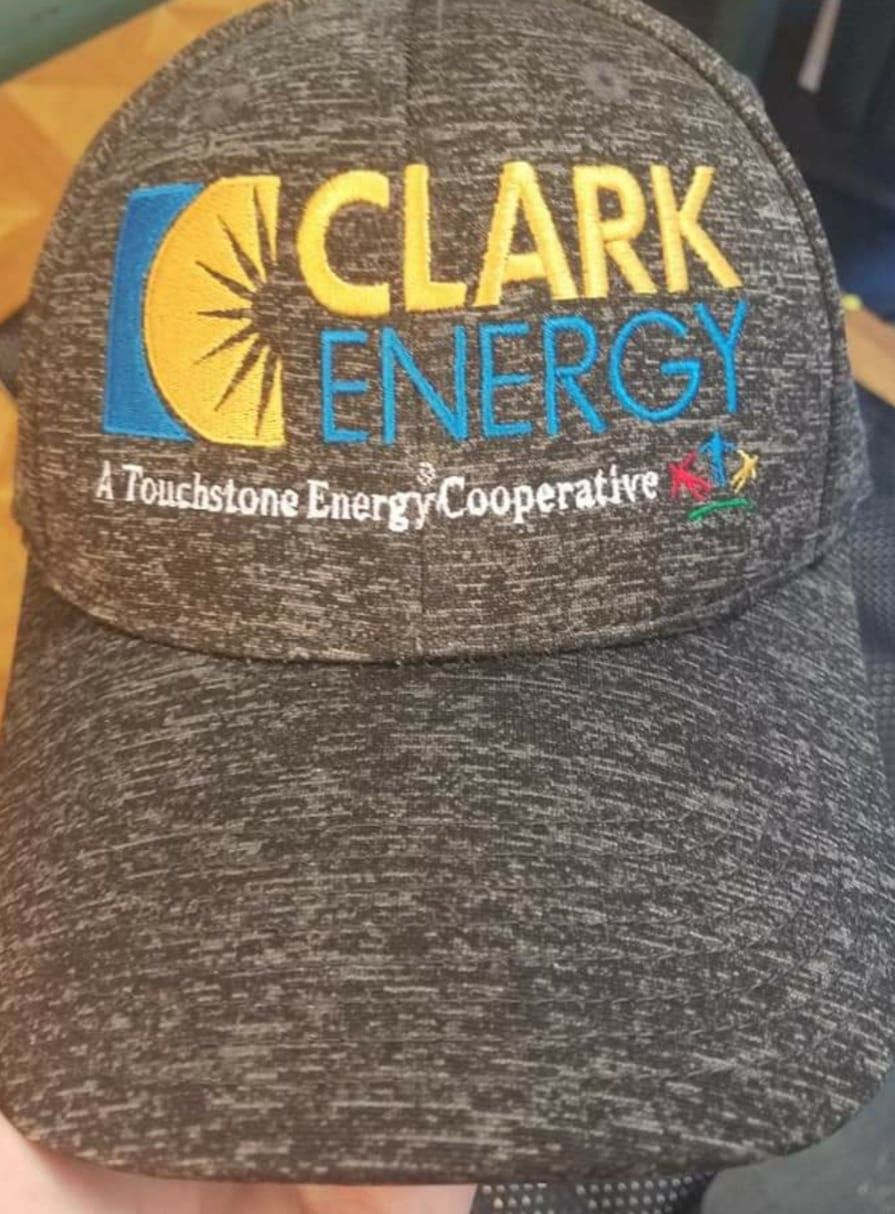 A baseball cap that says clark energy on it