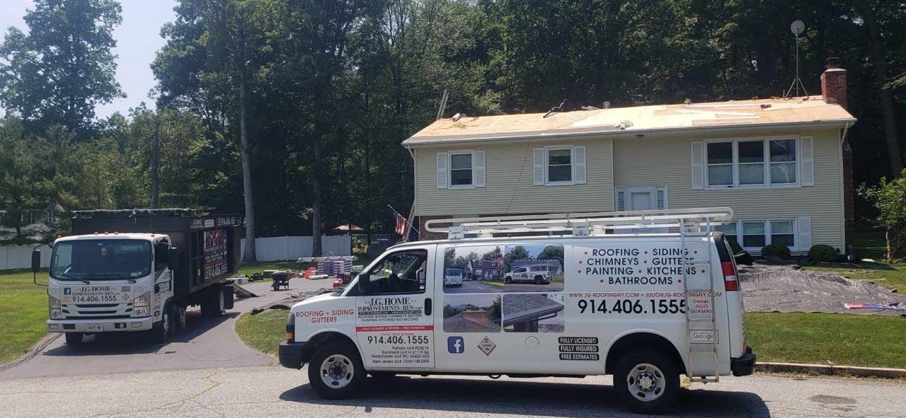A white van is parked in front of a house.