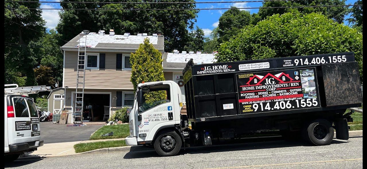 A dump truck is parked in front of a house.