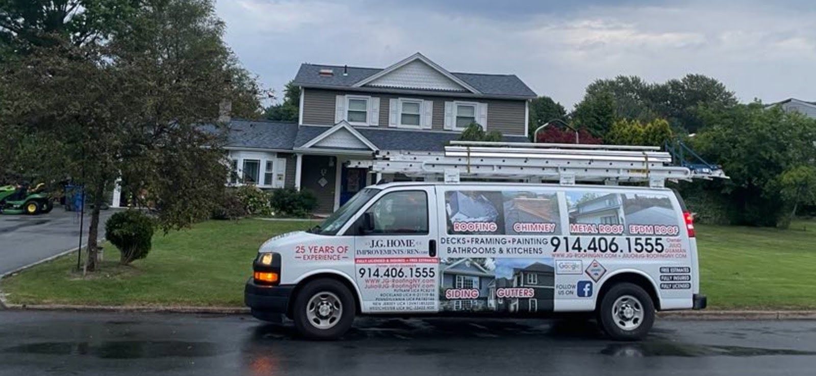 A white van is parked in front of a house on a rainy day.