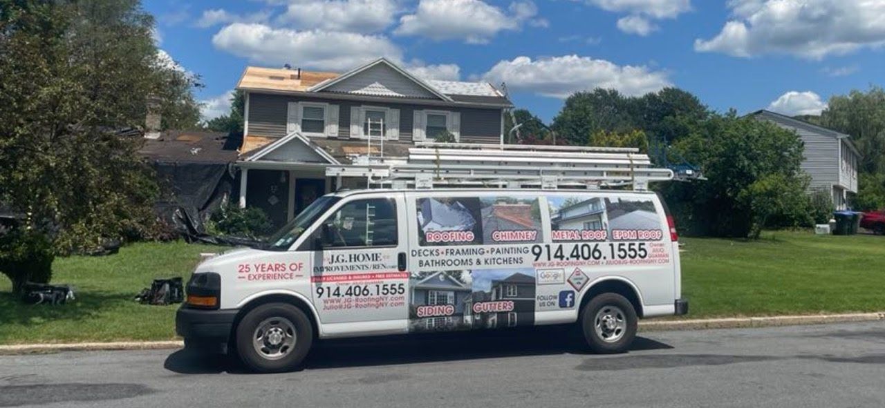 A white van is parked in front of a house.