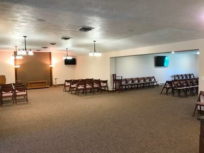 A large room with a lot of chairs in it.