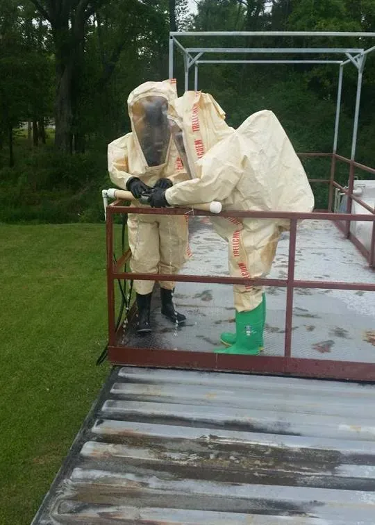 Two workers on hazmat suit — Ashford, AL — Environmental & Hazmat Services Inc.