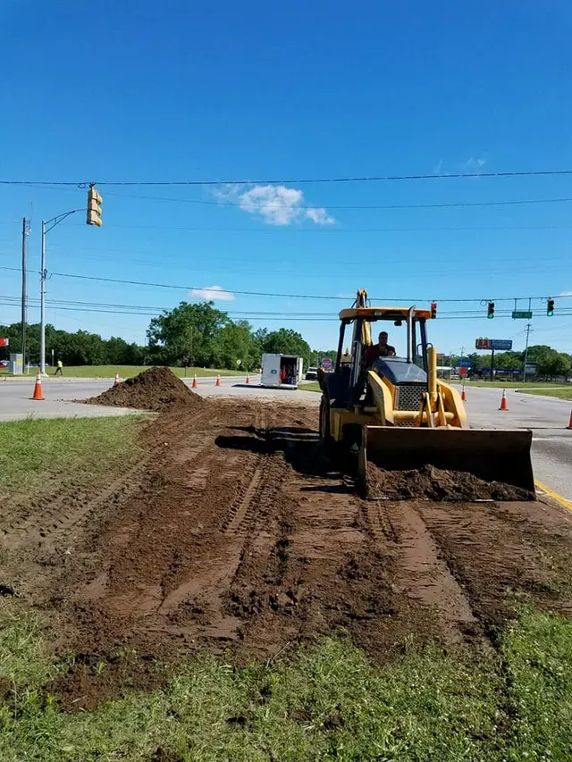 Yellow excavator on the site — Ashford, AL — Environmental & Hazmat Services Inc.
