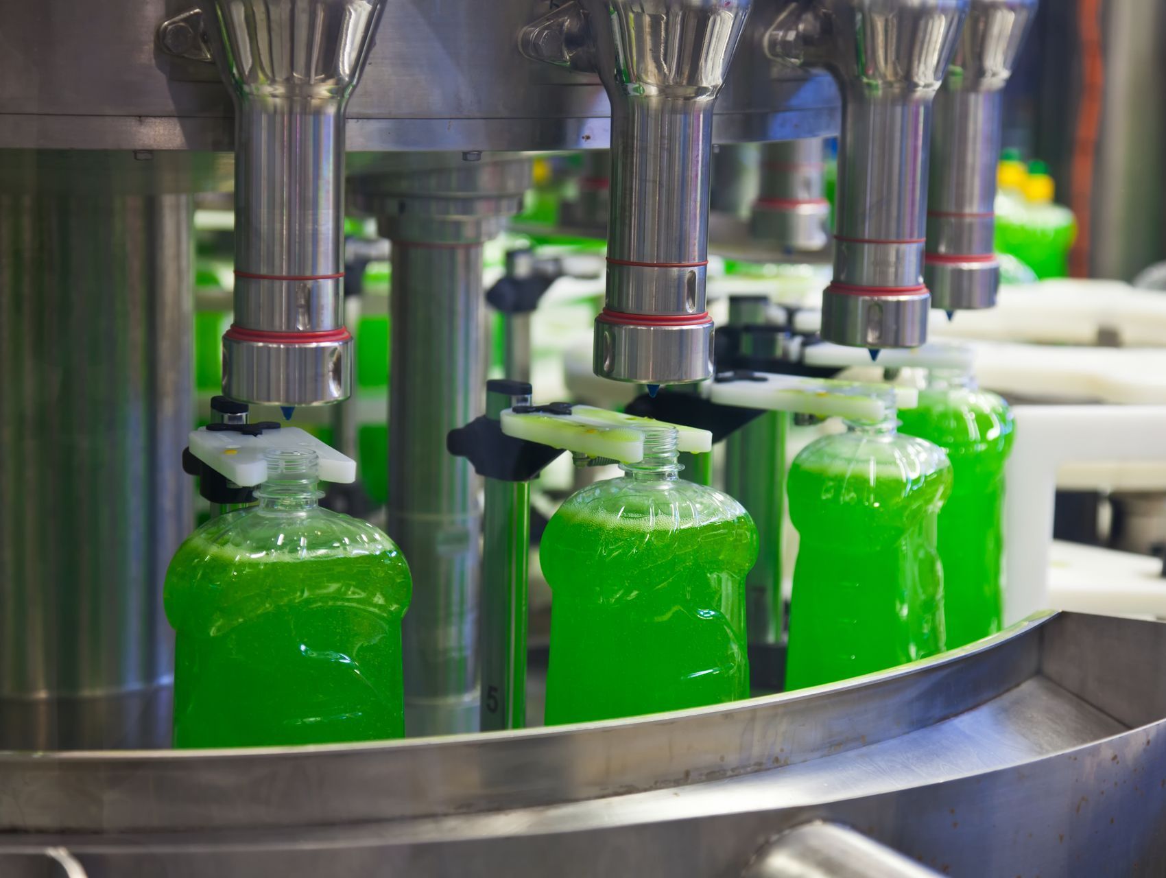 bottles being filled with a soap, benefitted by green solvents