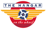 Logo for “The Hangar on the Wharf” with a blue airplane propeller over a red and orange sunburst.