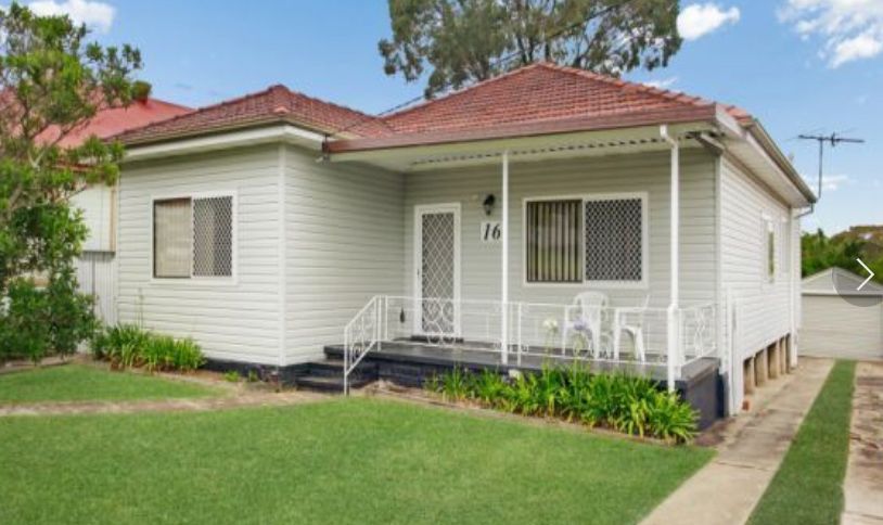 A White House with A Red Roof and A Porch — Maison Property Management in Mayfield, NSW