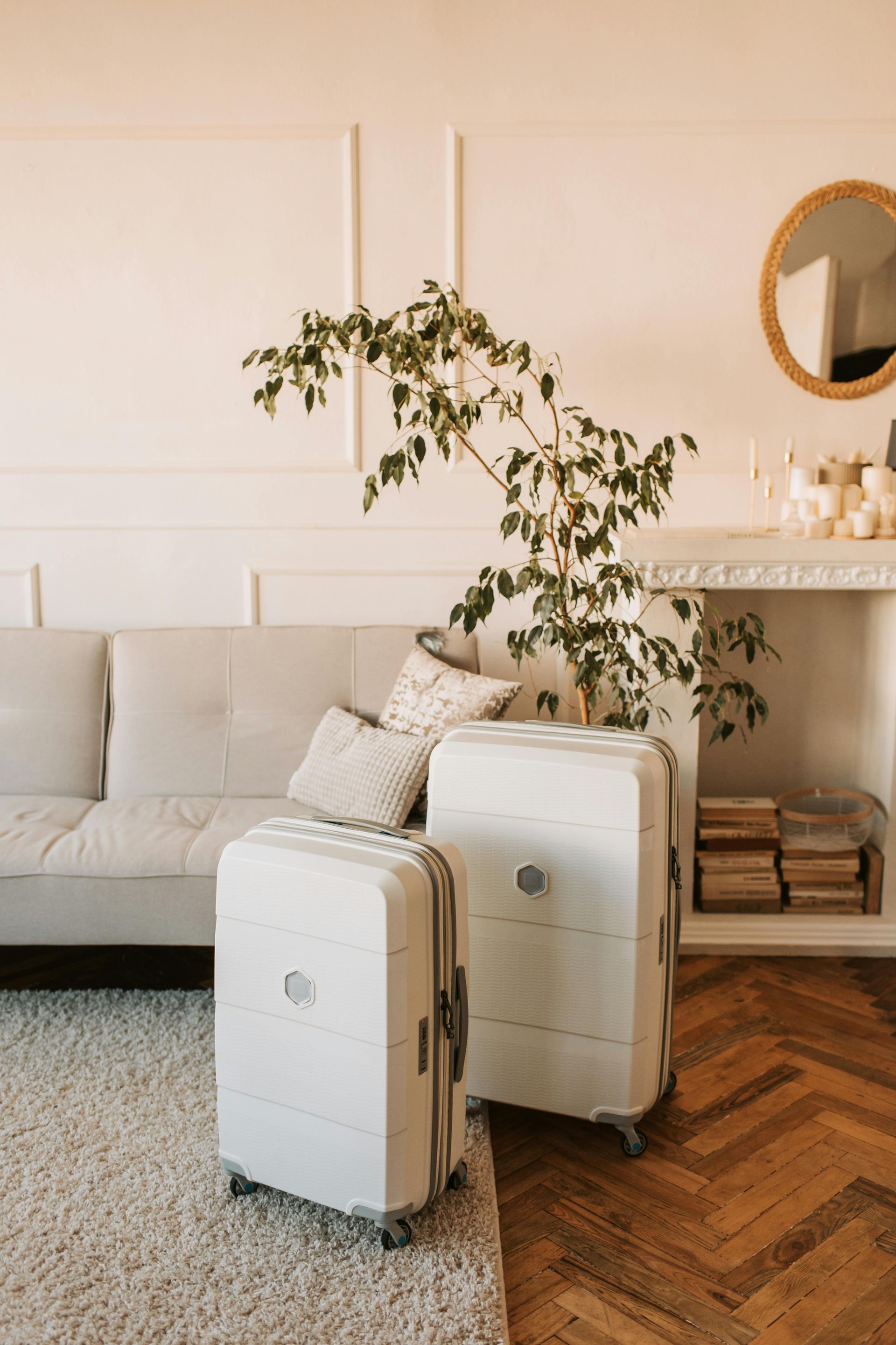 A Family Is Standing in A Hotel Room Looking at A Bed — Maison Property Management in Mayfield, NSW