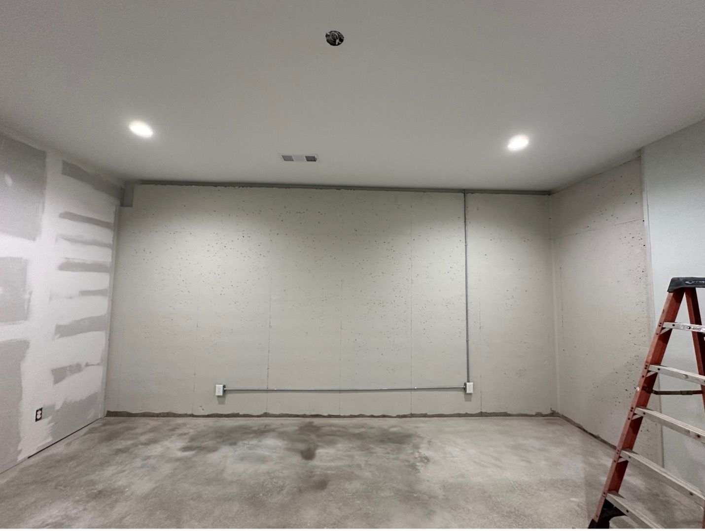 There is a ladder in the middle of the room.