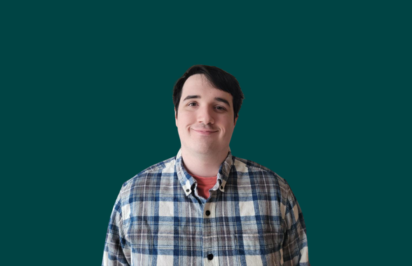 A close up of a dark green background.