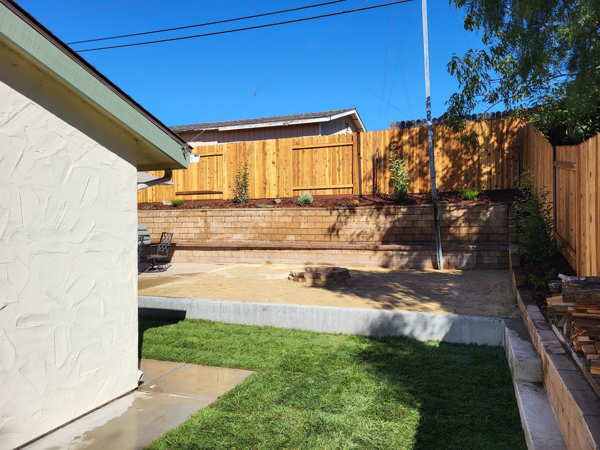 A house with two palm trees in front of it