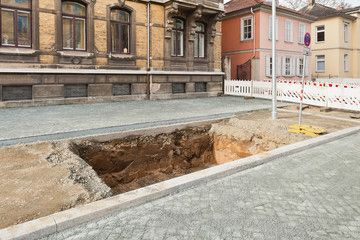 Under footpath, guttering, and kerb excavation