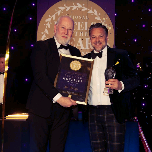 Hotelier of the Year 2024 Stephen Davies presents the 2025 Trophy to Kai Winkler of Fairmont St Andrews