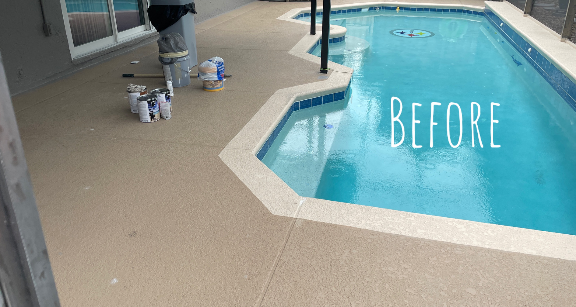 A picture of a swimming pool before being painted.