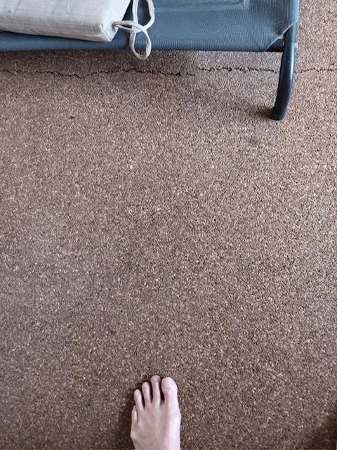 A picture of a swimming pool before being painted.