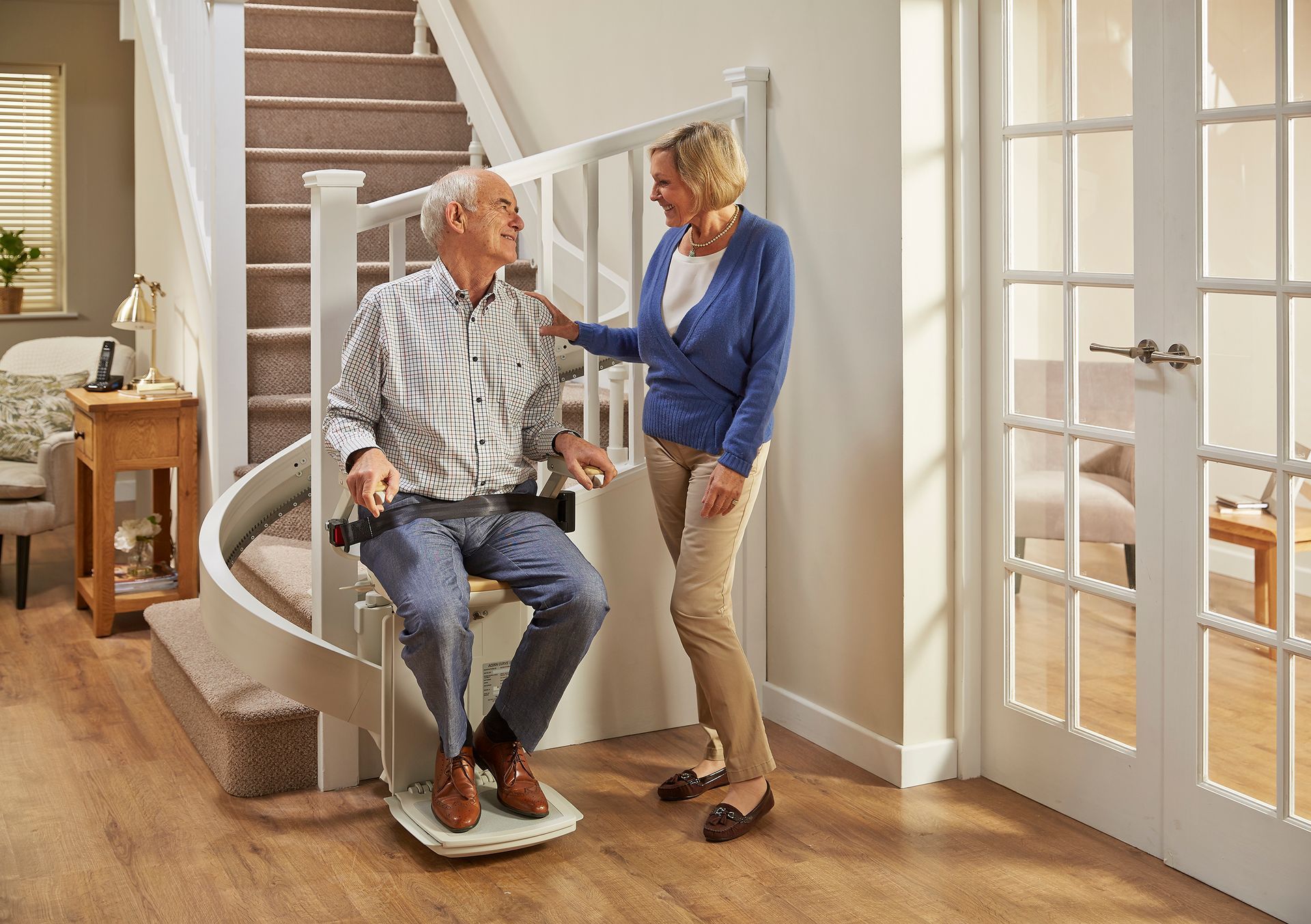 Acorn 180 curved stairlift with passenger