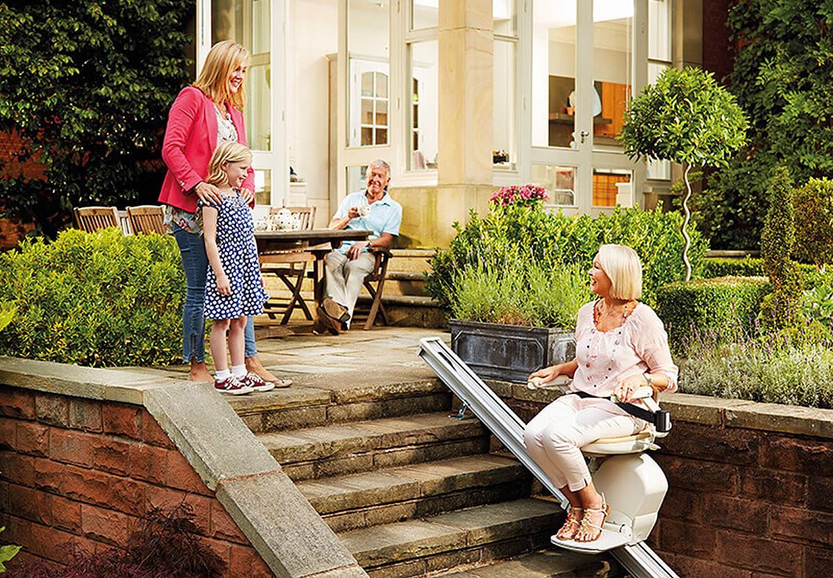 Acorn 130 straight outdoor stairlift in use