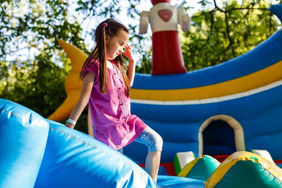 girl standing in the inflatable