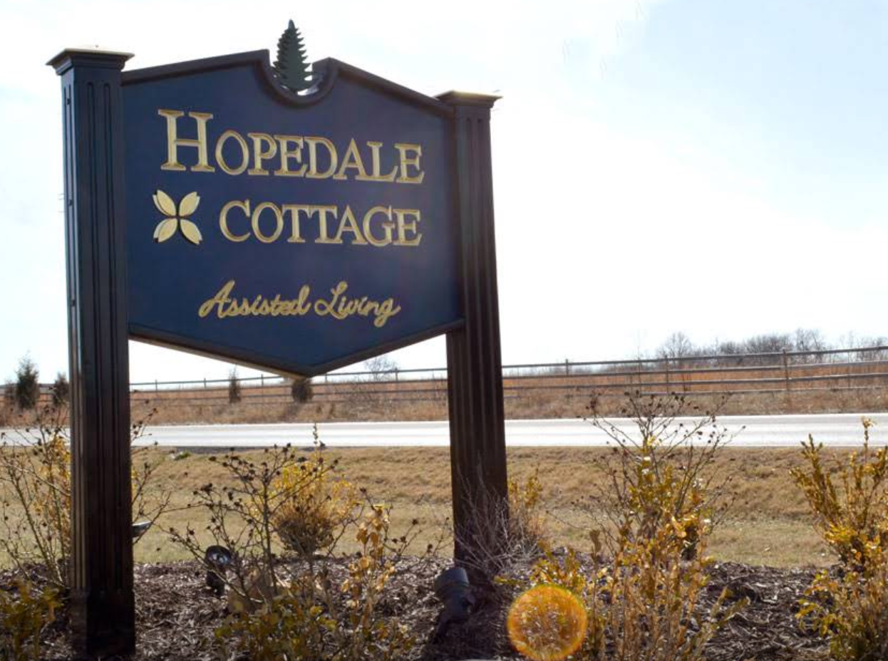 A sign that says hopedale cottage on it | Best memory care assisted living | Springfield MO