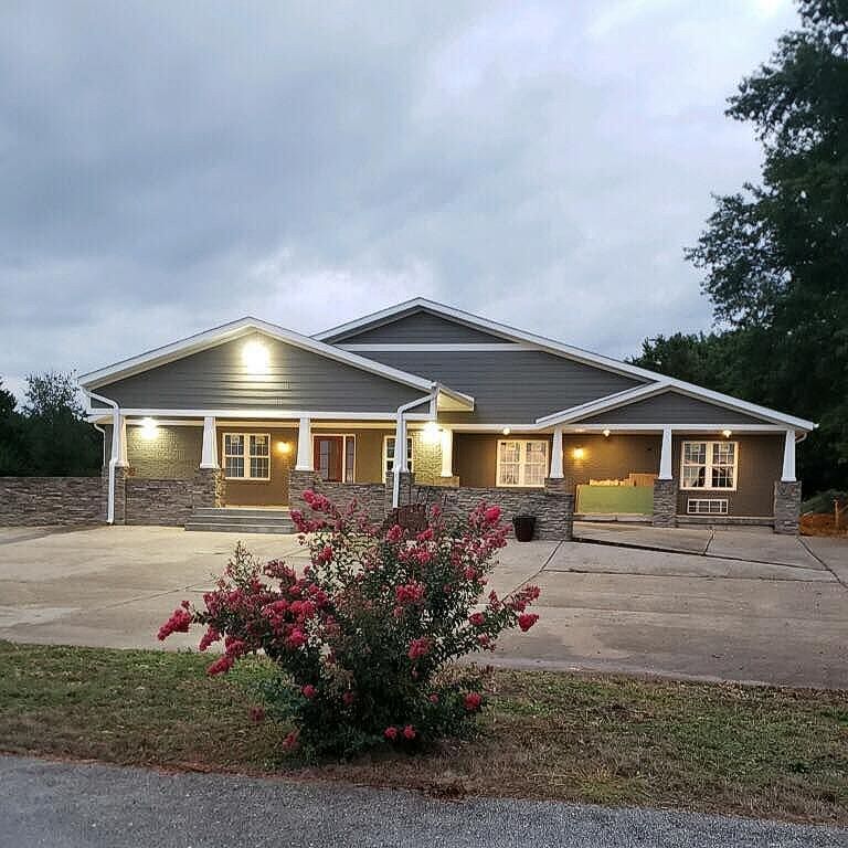 Out front of the Oaks Cottage | Best assisted living memory care apartment community near Springfield, MO