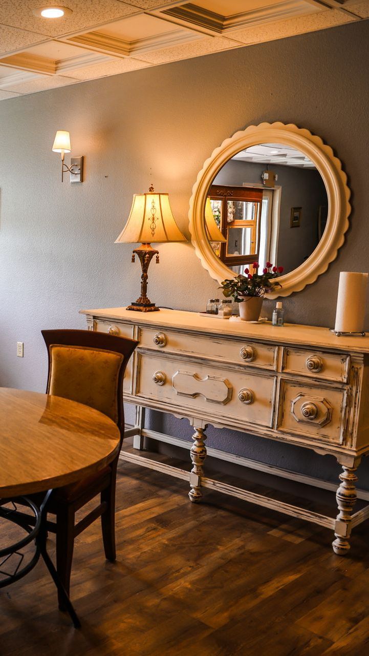 table and dresser inside our memory care community building in ozark mo