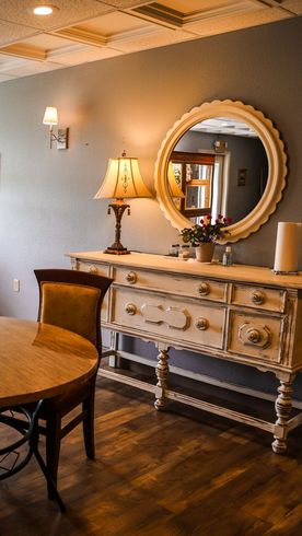 table and dresser inside our memory care community building in ozark mo
