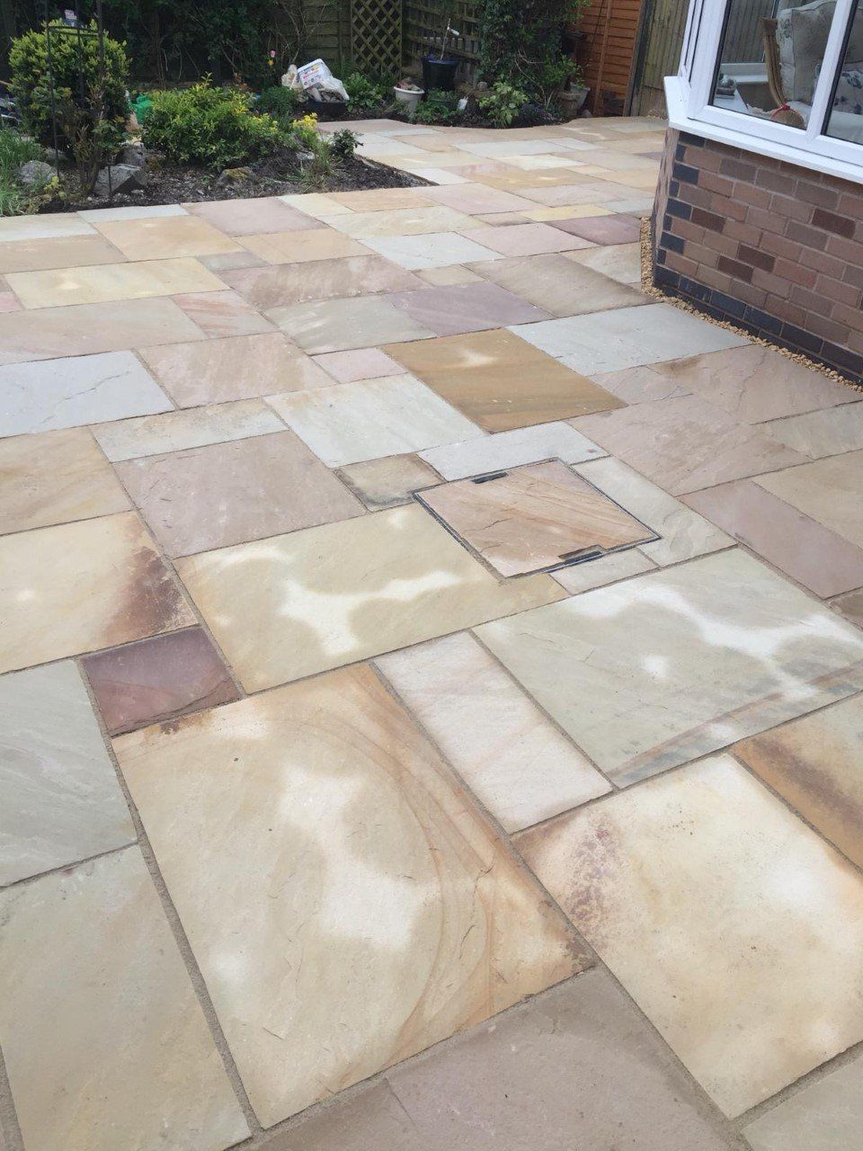 Natural stone patio by GQ General Builders Wolverhampton
