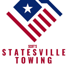 A logo for statesville towing with an american flag on it