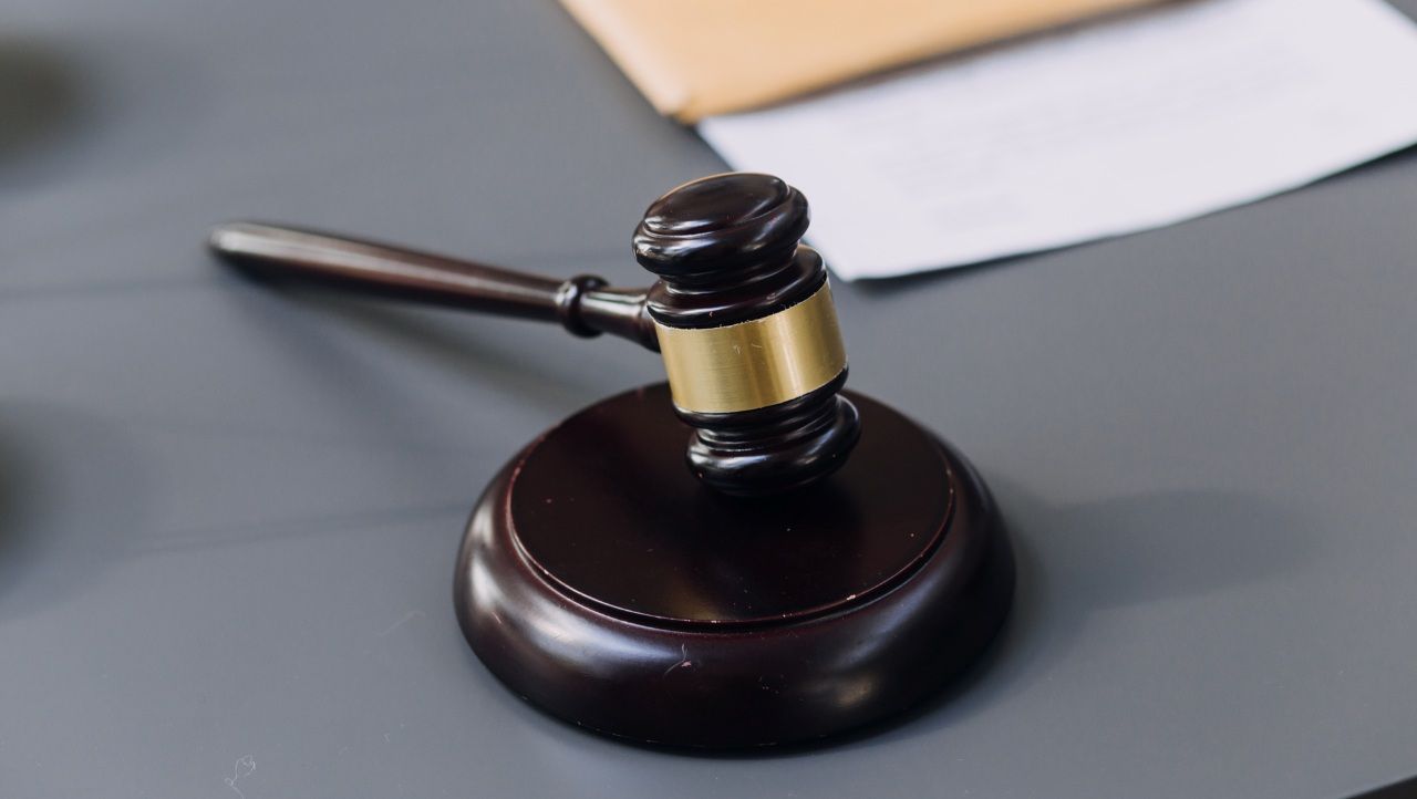 gavel on a grey table