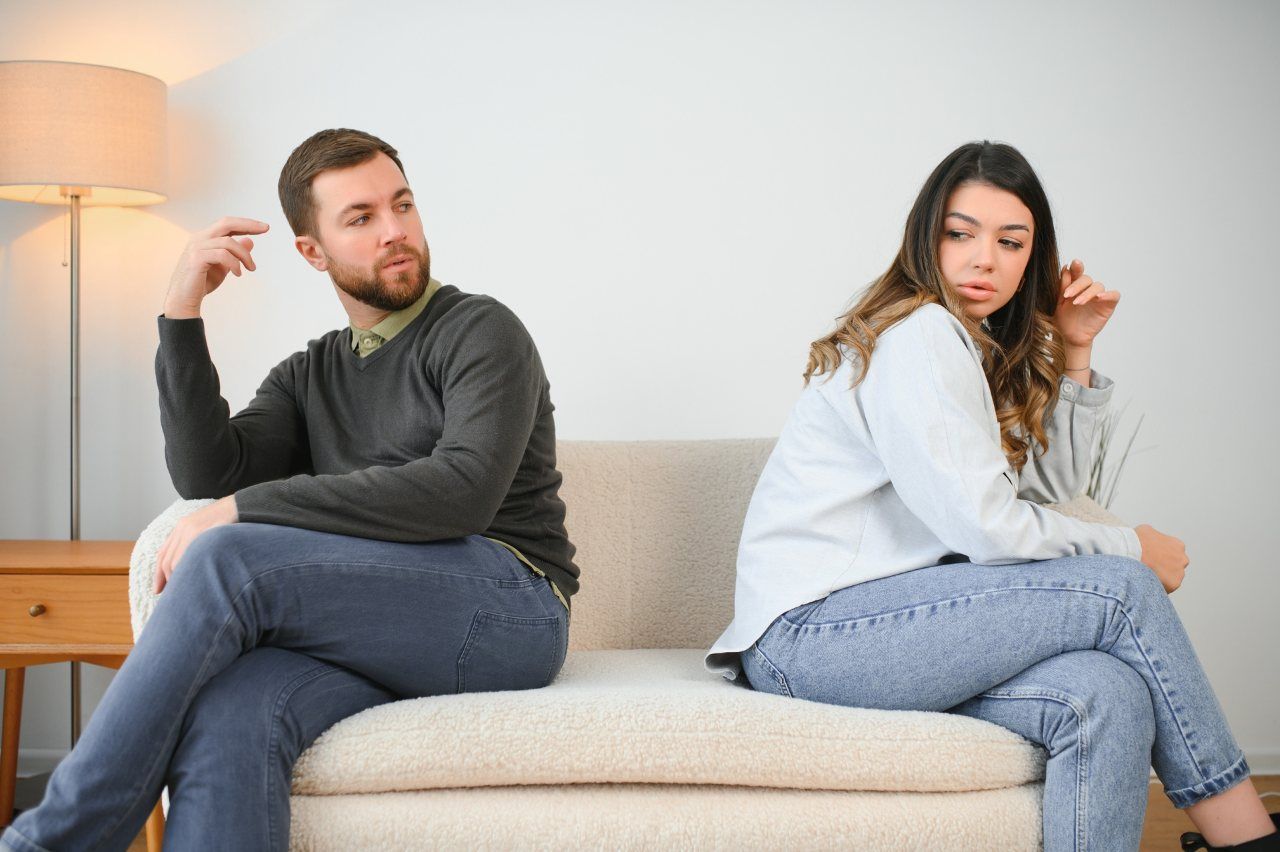 Man and woman feeling stressed and angry at each other