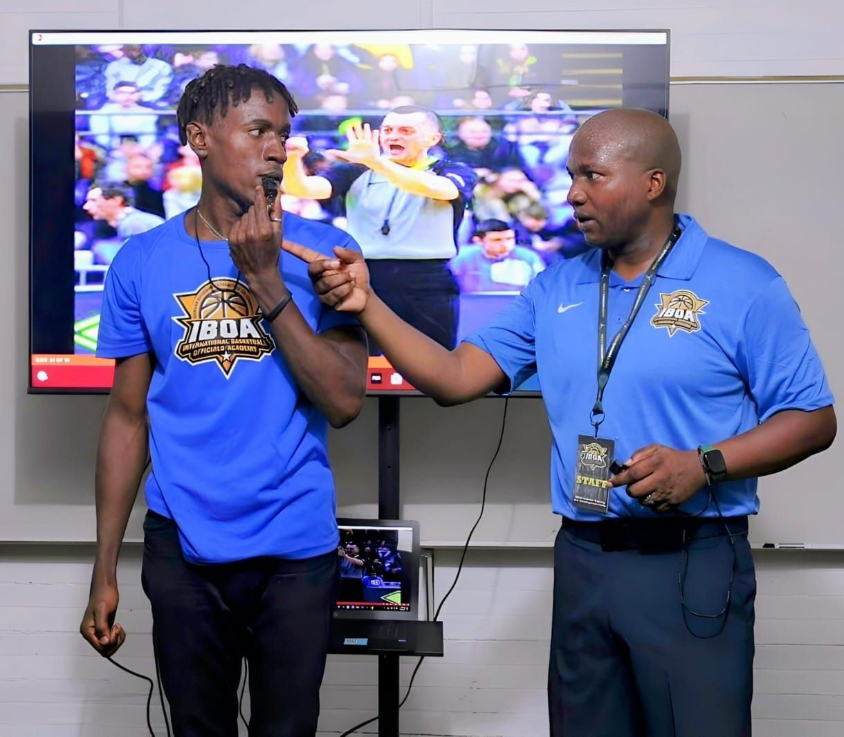 Referee Intructor Mark Lewis teaching at the IBOA basketball officials training camp.