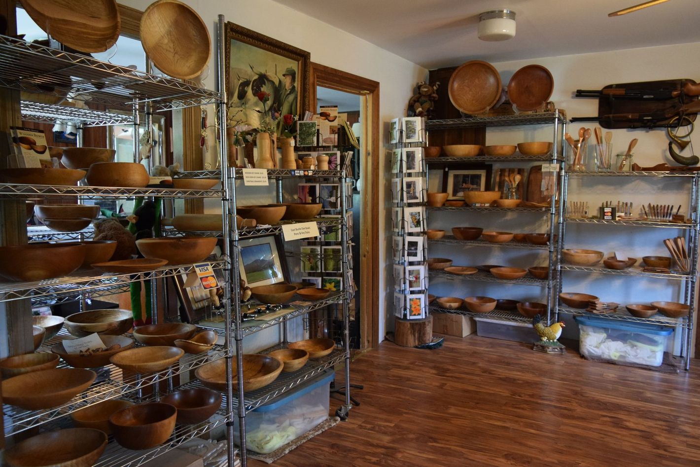 Sanderson's Wooden Bowls Showroom is filled with shelves filled with wooden bowls and plates in VT.