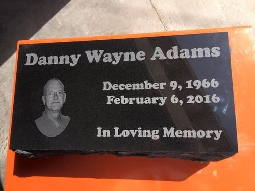 headstone with portrait engraving