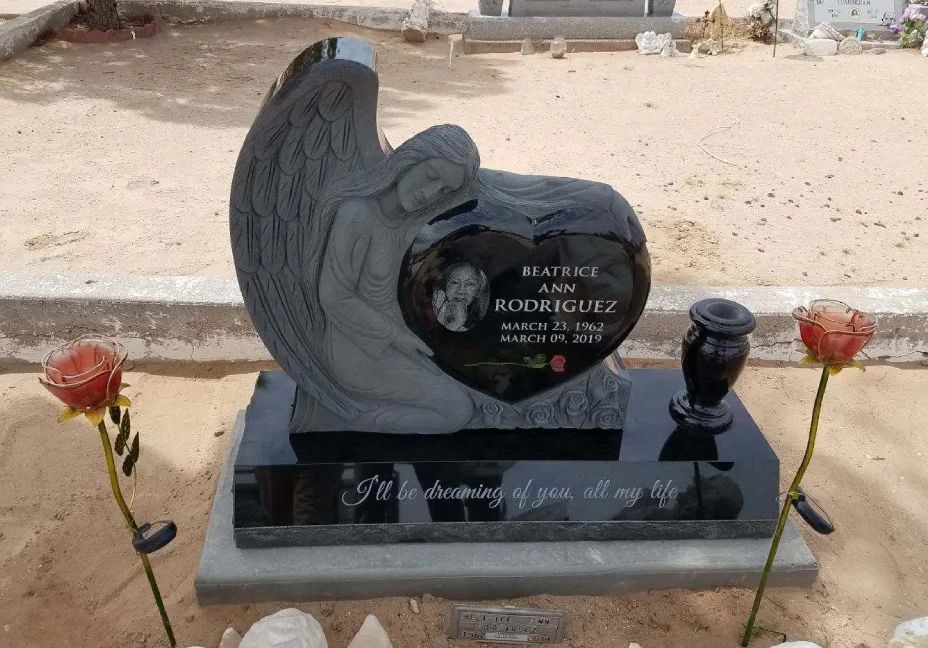 Grey and black angel and heart headstone