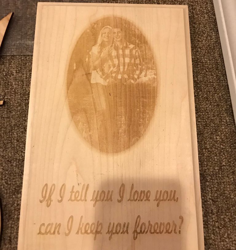 wooden engraving of couple
