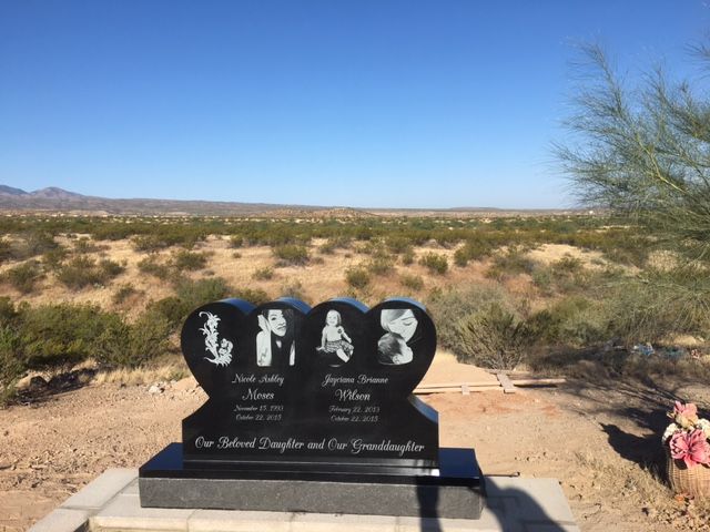 headstone with multiple portraits