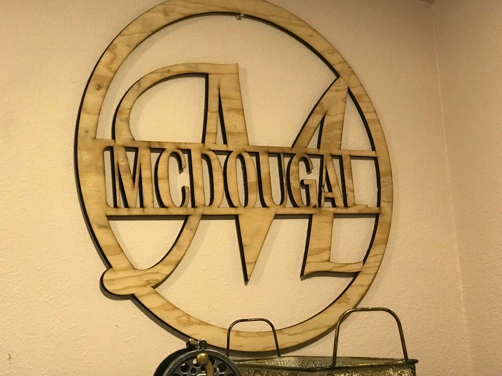 mcdougal logo wooden sign