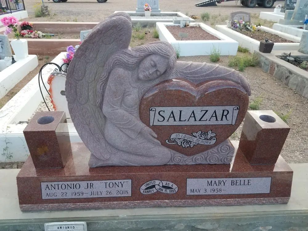 upright angel and heart headstone