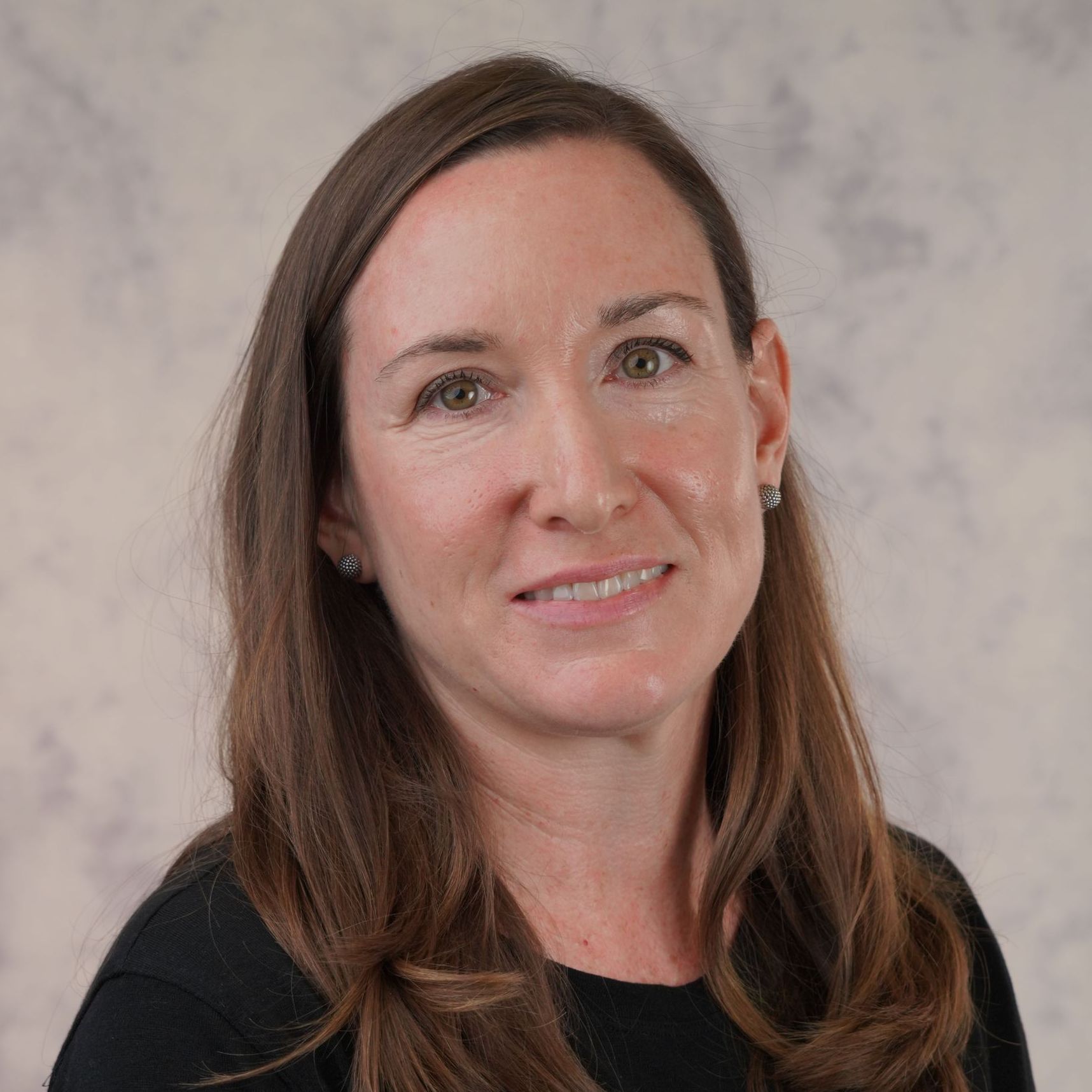 Headshot of Beth Henderson.