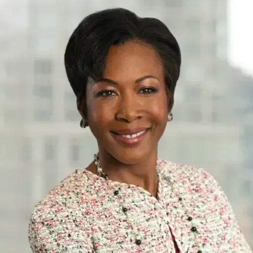 Headshot of Ghillaine Reid. 