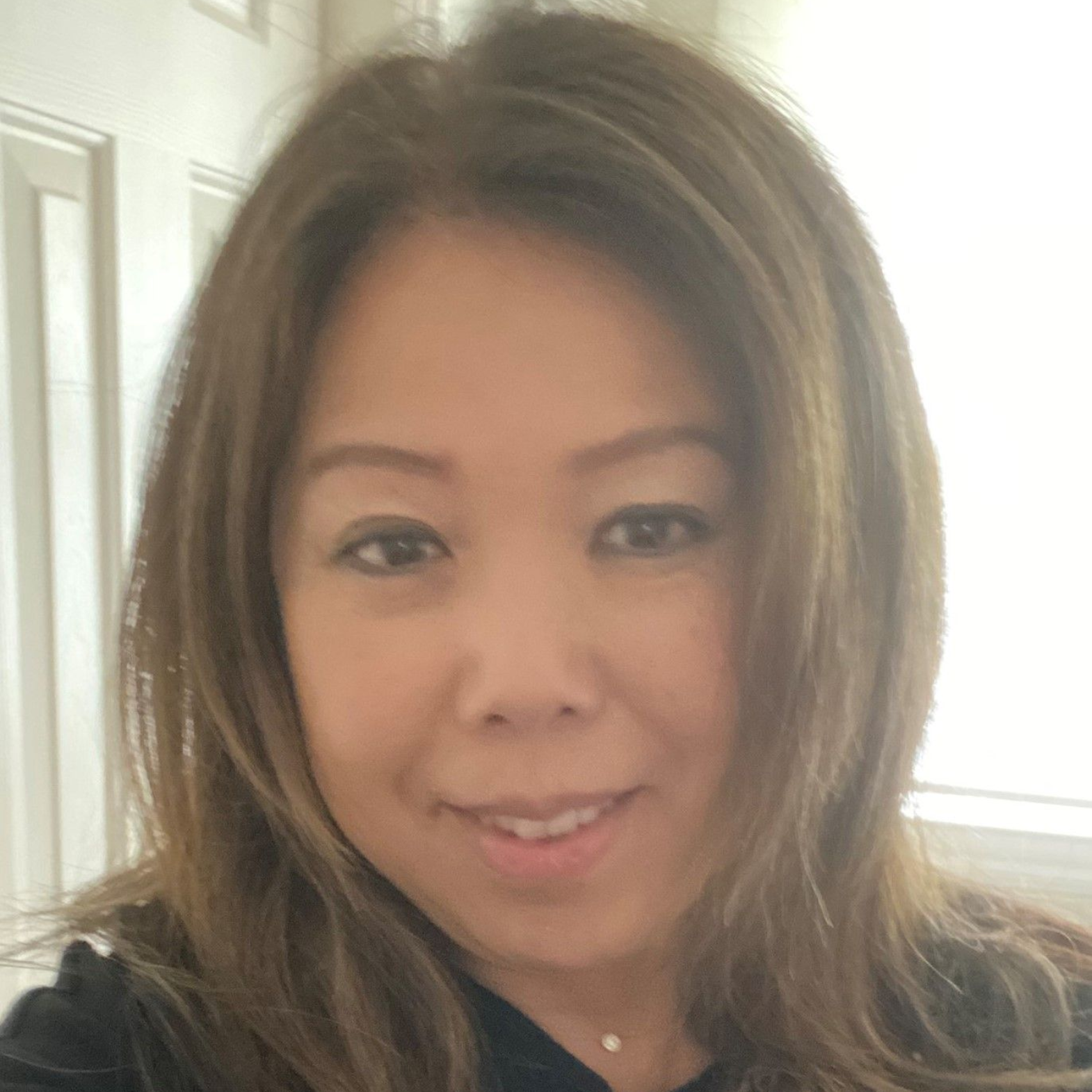 Headshot of Sharon Wong. 